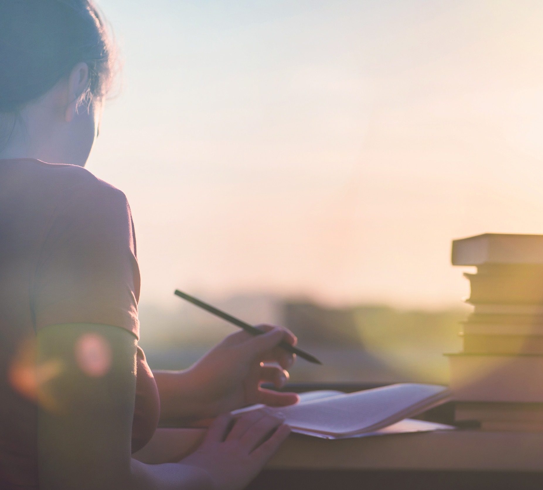 woman with pen in hand